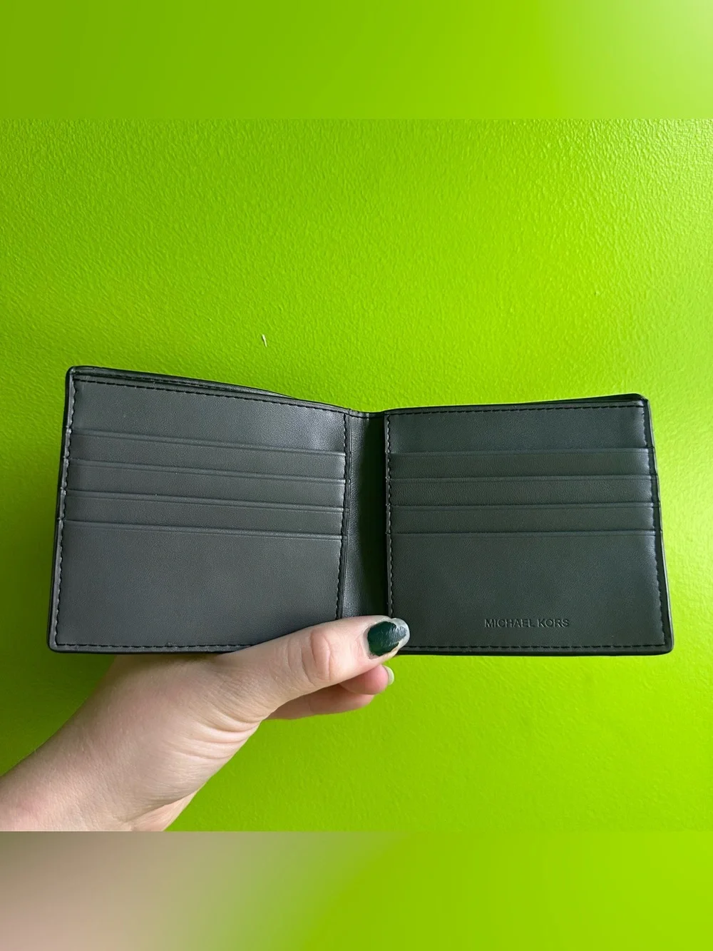 Michael Kors Black Leather Bi-Fold Wallet with MK Patch
